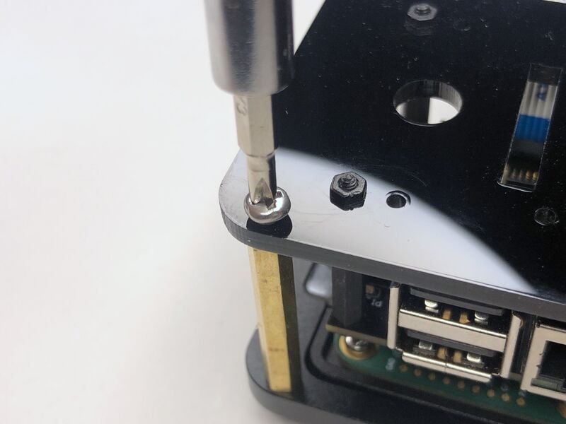 Secure the backplate using metal screws