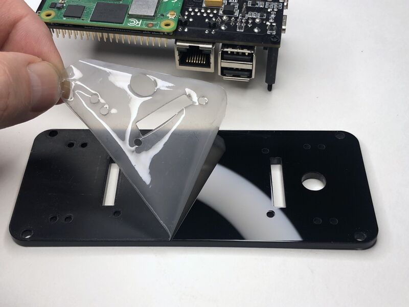 Remove the safety film from the backplate