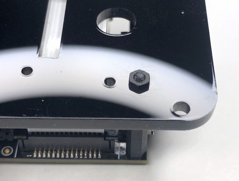 Secure backplate with nylon nuts