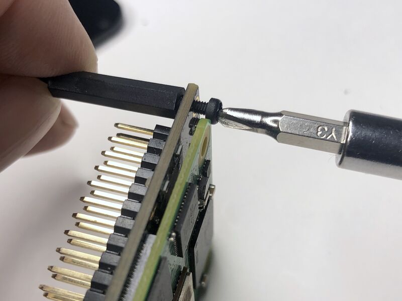 Secure four nylon spacers using nylon bolts