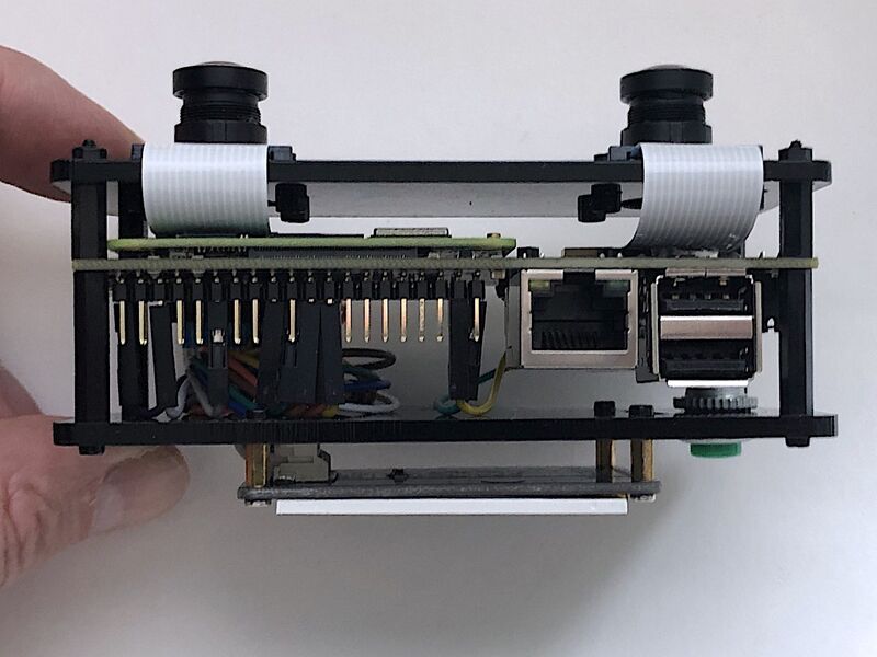 The screen and the button are installed, side view